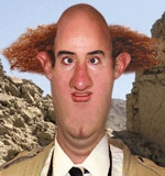 A September 2001 file photo of <i>Mad</i> reporter Fonebone while on assignment near the Blecchistani city of Plort.